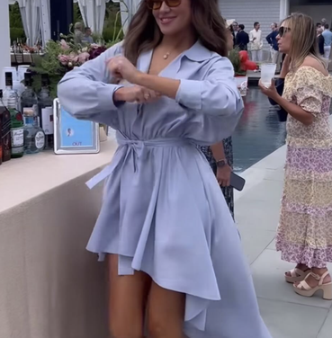 Brynn Whitfield’s Blue Asymmetric Shirt Dress