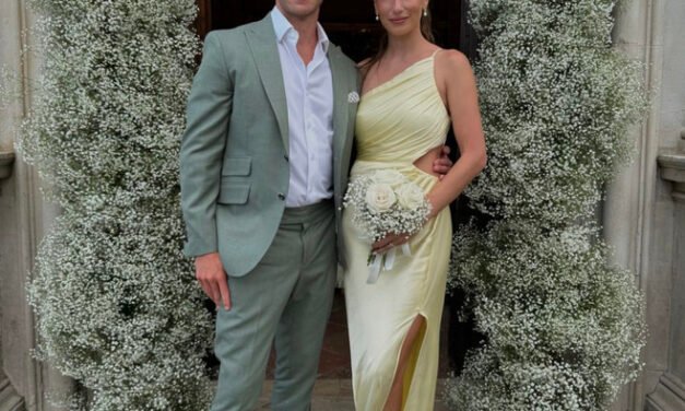 Amanda Batula’s Yellow Satin Cutout One Shoulder Dress